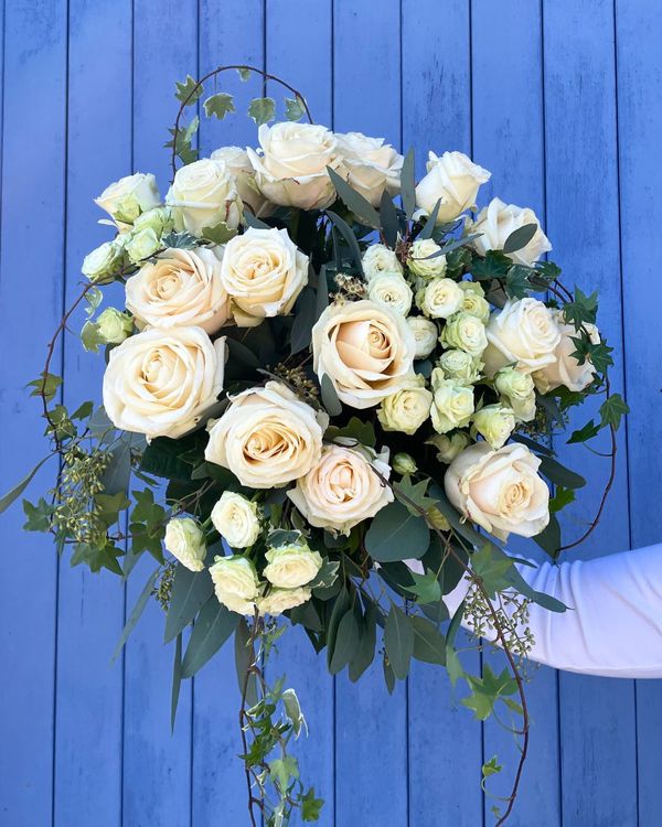 A CASCADE OF WHITE ROSES